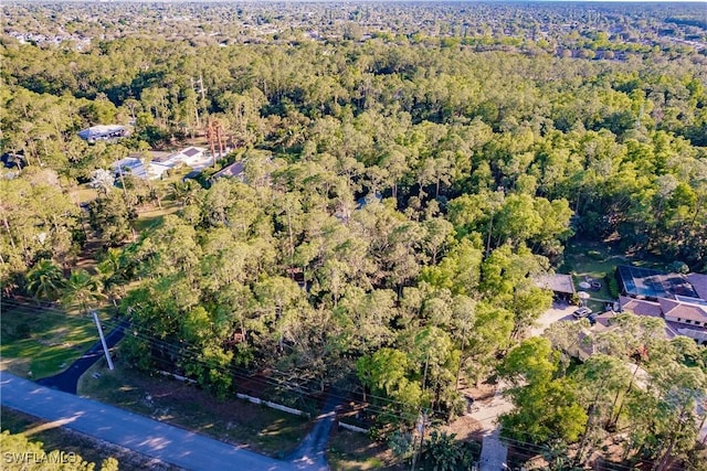 bird's eye view featuring a view of trees