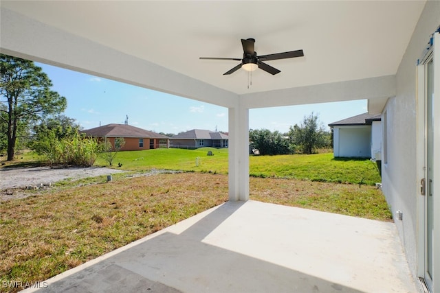 view of patio / terrace featuring ceiling fan