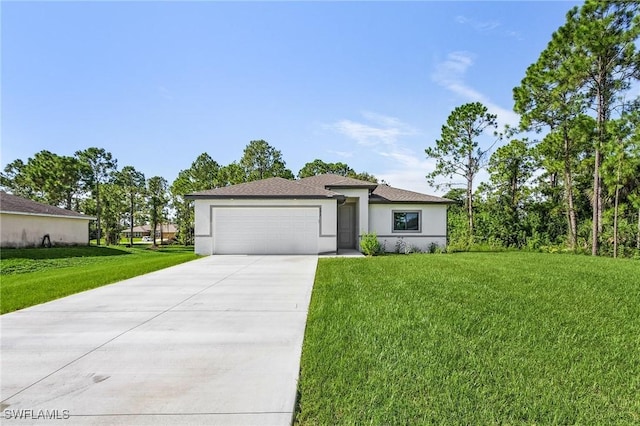 view of front of house featuring a front yard and a garage