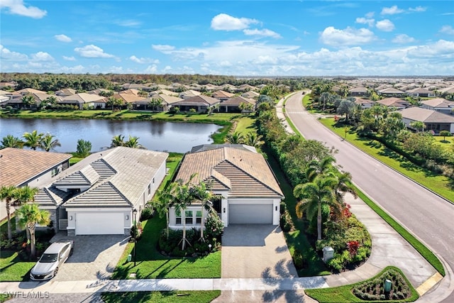 drone / aerial view with a water view