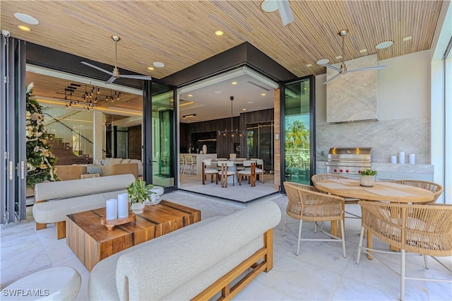 view of patio / terrace featuring an outdoor hangout area, outdoor dining area, and a grill