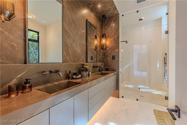 full bath with a shower stall, backsplash, double vanity, and tile walls