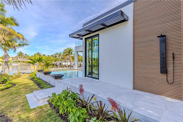 view of patio featuring a water view