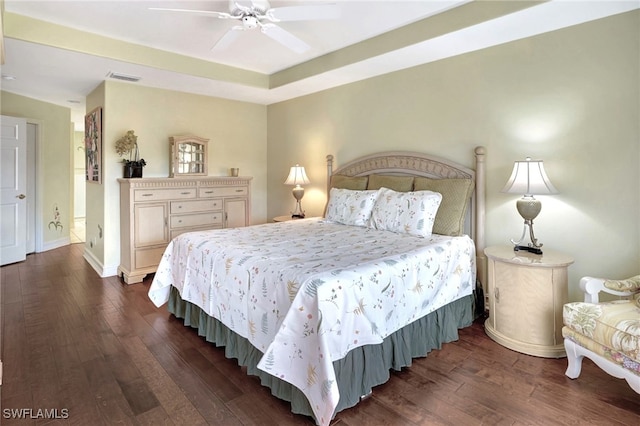 bedroom featuring ceiling fan and dark hardwood / wood-style flooring