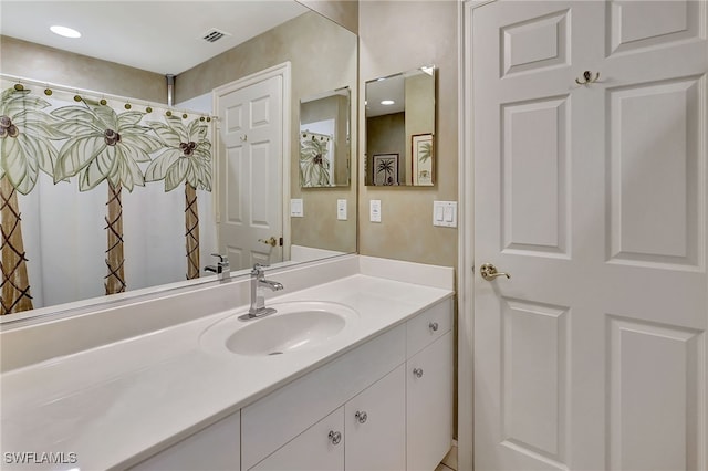 full bath featuring visible vents and vanity