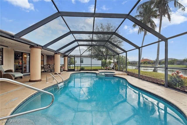 view of pool with a lanai, a water view, an in ground hot tub, and a patio