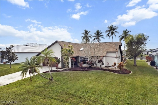 view of front facade with a front lawn