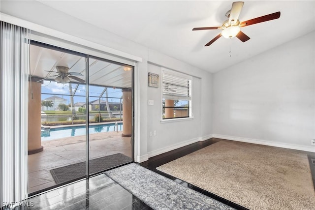 doorway featuring ceiling fan and wood-type flooring