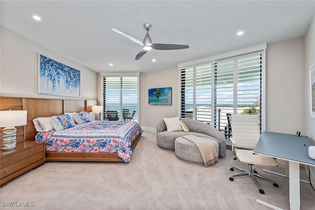 bedroom featuring ceiling fan and carpet floors