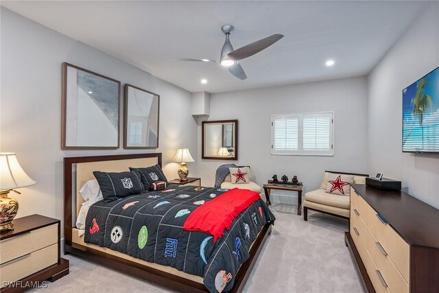 carpeted bedroom featuring ceiling fan