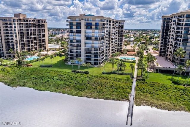 view of building exterior with a water view