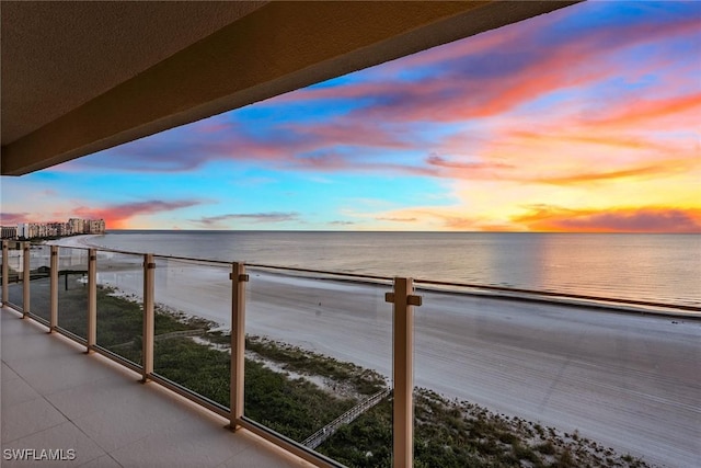 balcony at dusk with a water view