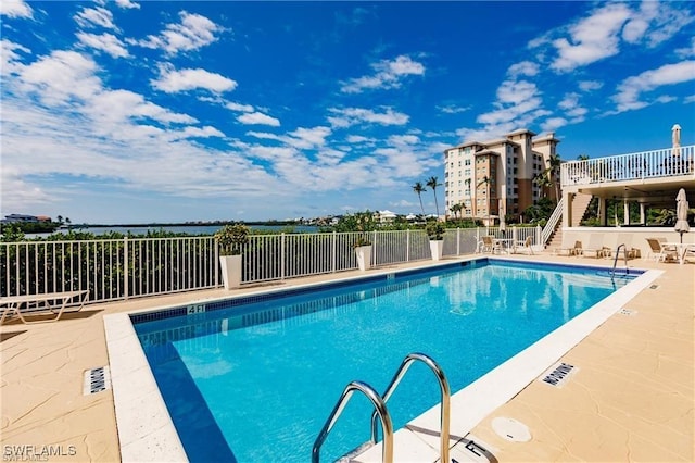 view of pool featuring a patio area