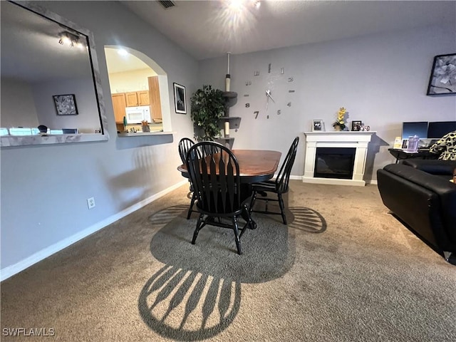 view of carpeted dining room