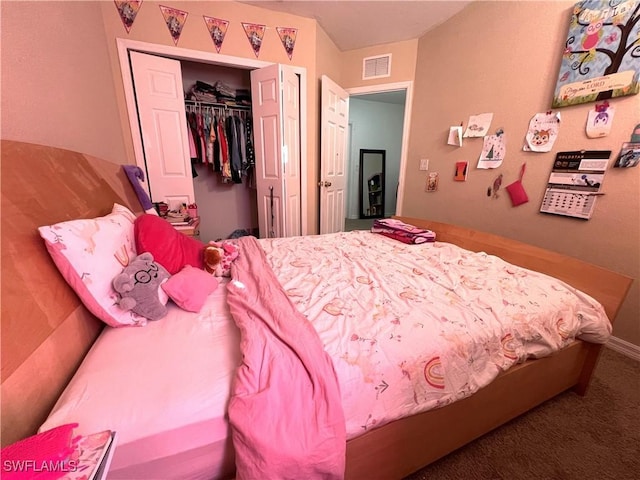 bedroom featuring a closet and carpet floors