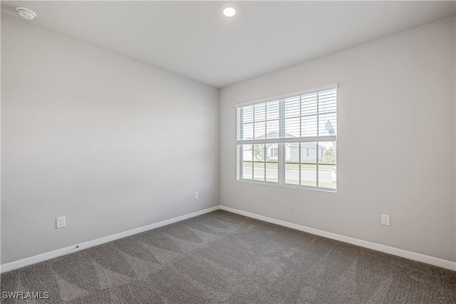 view of carpeted spare room