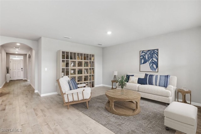 living room featuring light wood-type flooring