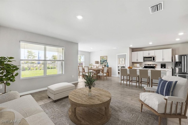 living room featuring light hardwood / wood-style floors