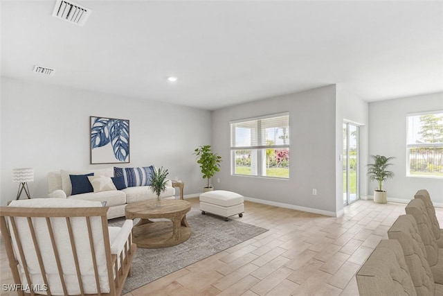 living room with light hardwood / wood-style floors