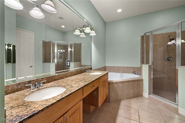 bathroom featuring separate shower and tub, tile patterned flooring, and vanity