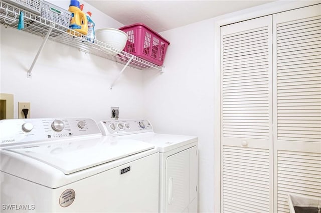 laundry area with washer and dryer