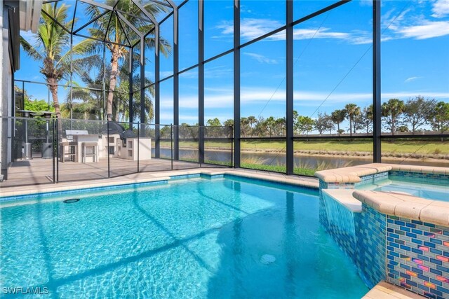 view of pool with glass enclosure, an in ground hot tub, and a patio