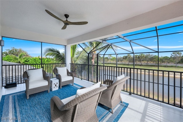 sunroom / solarium featuring ceiling fan