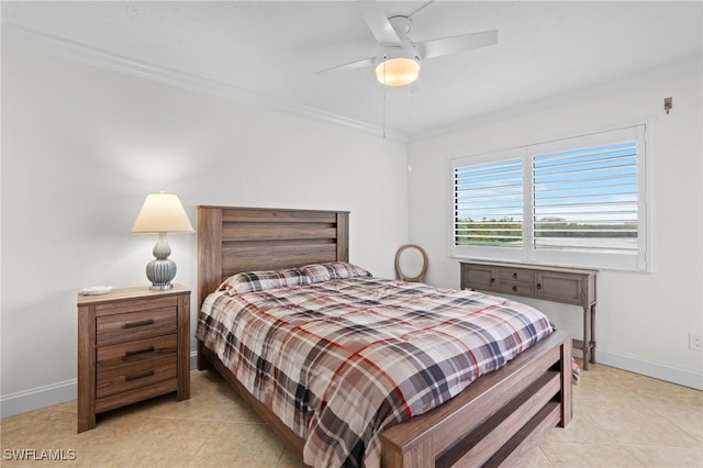 tiled bedroom with ceiling fan and ornamental molding