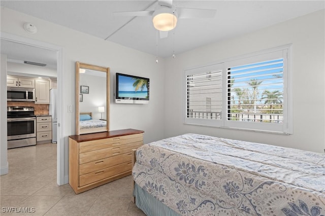 tiled bedroom with fridge and ceiling fan