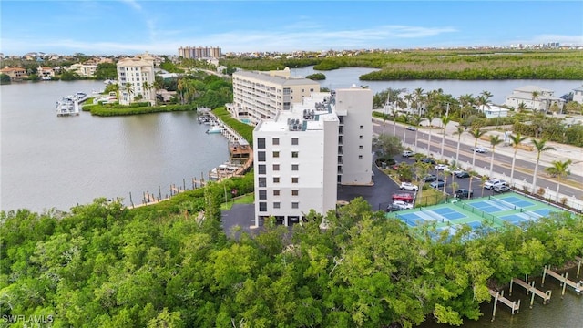 birds eye view of property featuring a water view