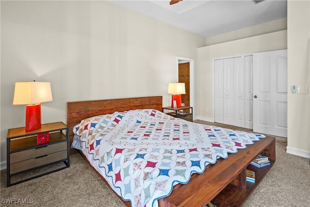 bedroom with a ceiling fan, baseboards, a closet, and carpet flooring