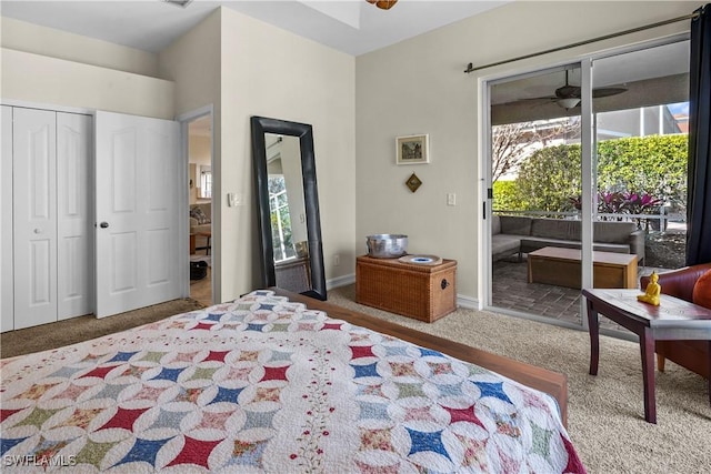 carpeted bedroom featuring access to outside and baseboards