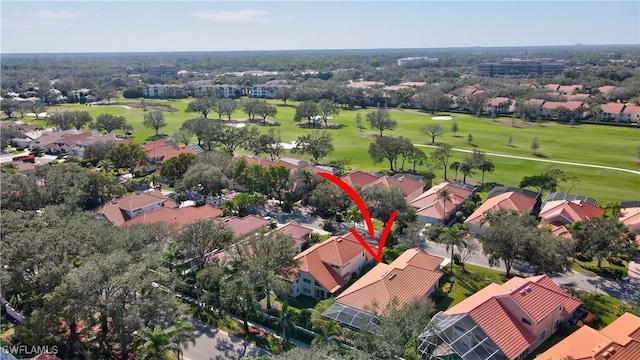 aerial view with a residential view and view of golf course