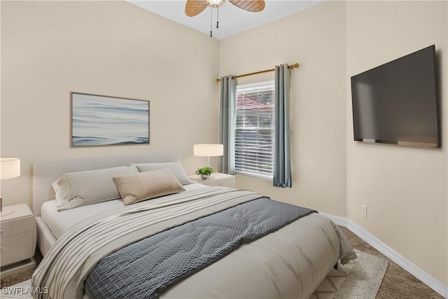 carpeted bedroom with baseboards