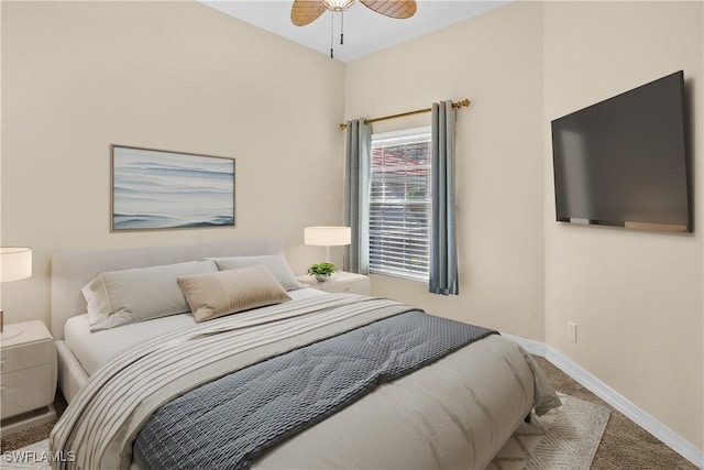 bedroom featuring carpet flooring and baseboards