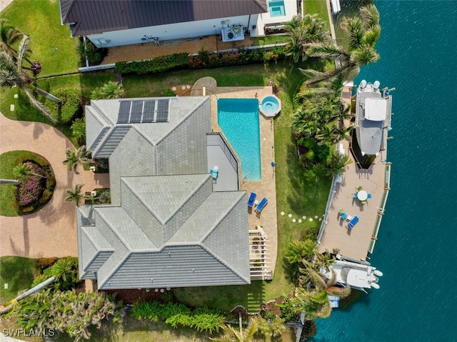 birds eye view of property featuring a water view