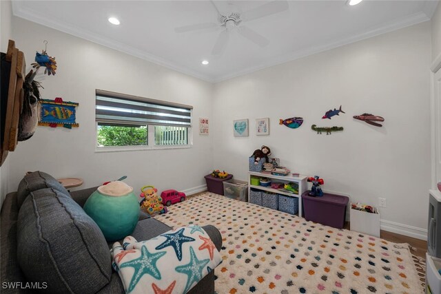 bedroom featuring hardwood / wood-style floors, ceiling fan, and ornamental molding