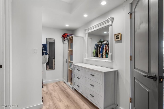 walk in closet featuring light wood-type flooring