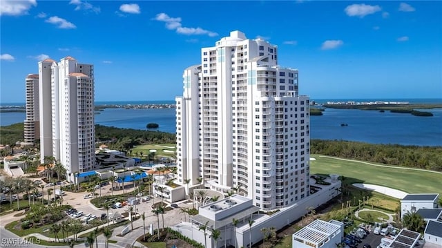 birds eye view of property with a water view