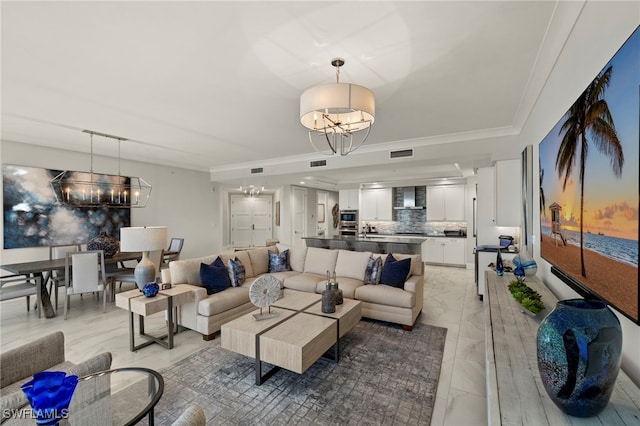 living room with a notable chandelier