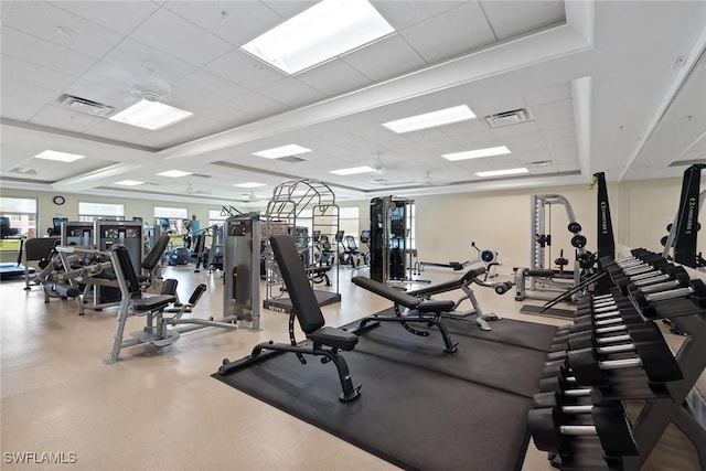 exercise room with a drop ceiling