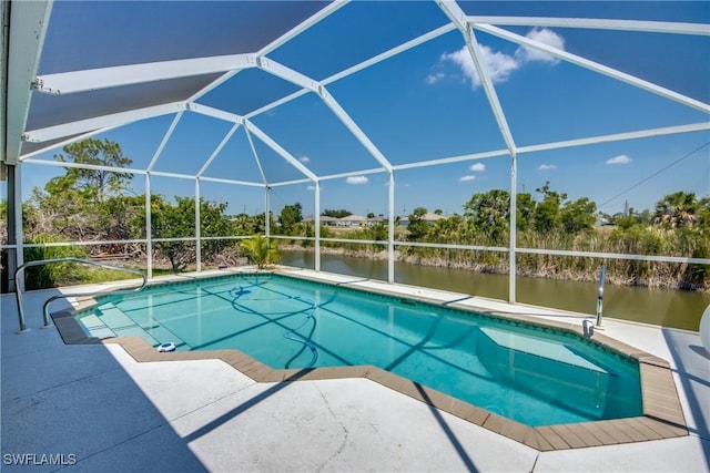 view of swimming pool featuring a patio, a water view, and a lanai