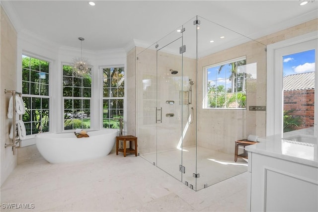 bathroom featuring crown molding and independent shower and bath