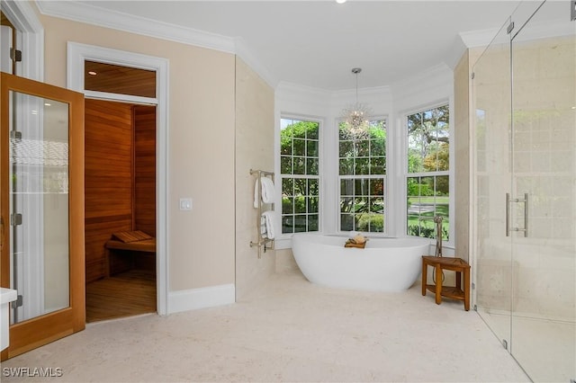 bathroom with plus walk in shower, a chandelier, and ornamental molding