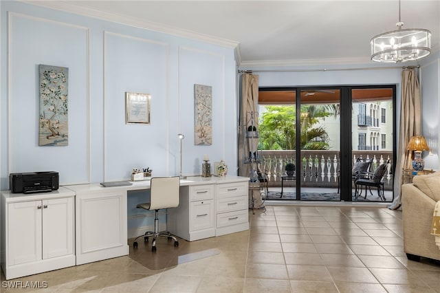 tiled home office featuring ornamental molding, built in desk, and an inviting chandelier