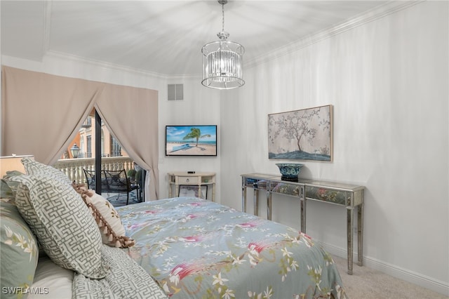 carpeted bedroom featuring access to outside, ornamental molding, and an inviting chandelier