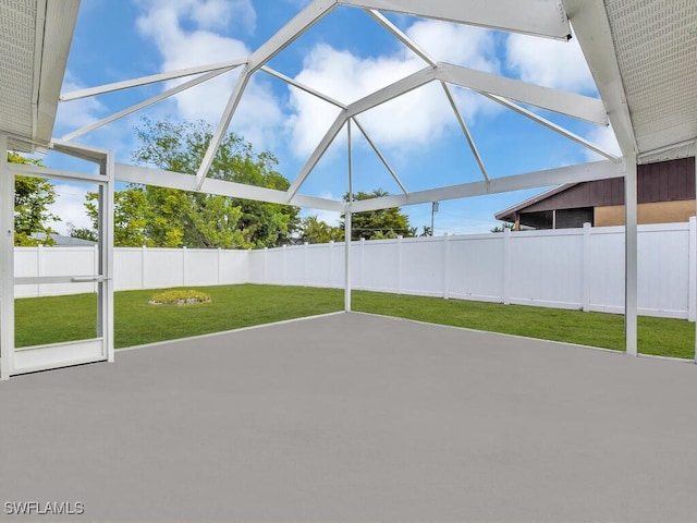 view of patio / terrace featuring a lanai