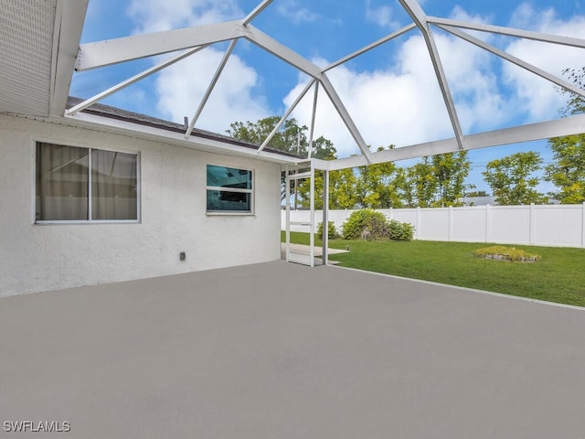 view of patio / terrace with a lanai