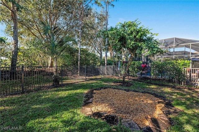 view of yard with a lanai