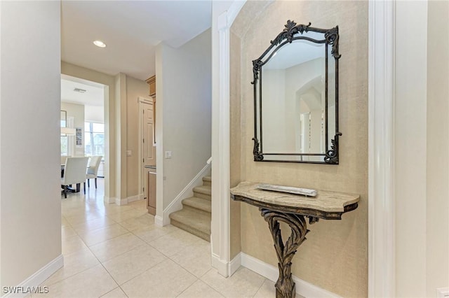 hallway with light tile patterned floors